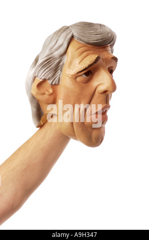John Kerry Mask on outstretched arm Stock Photo