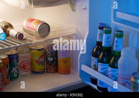 mini fridge full of bottled water isolated on white Stock Photo - Alamy