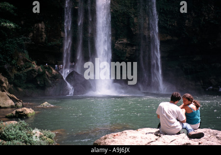Tourists at the waterfall of Misol-Ha between Palenque and Agua Azul in the Mexican province of Chiapas. Stock Photo