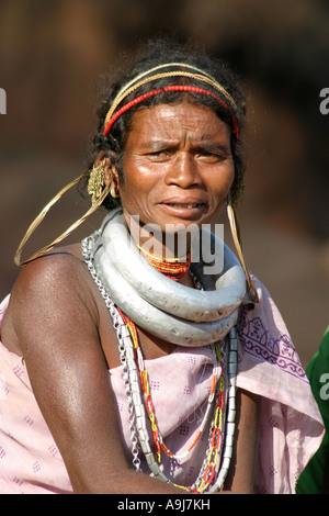 A Gadaba  tribal woman wearing traditional heavy metal necklaces .Orissa  India Stock Photo