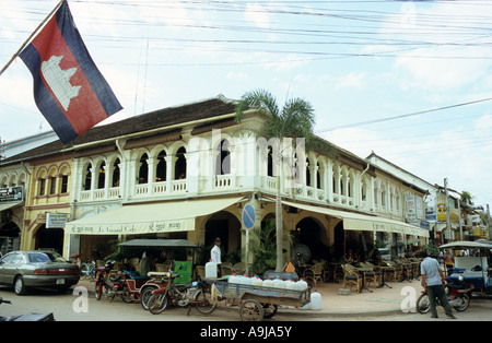 Le Grand Cafe in an old French colonial building, and Cambodian flag, Siem Reap, Cambodia Stock Photo