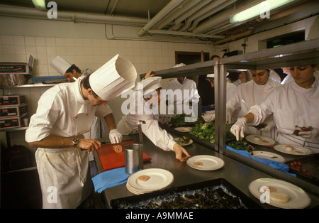 Chefs at work in a commercial kitchen at Fishmongers Hall. Preparing a City of London banquet for the Worshipful Company of Fishmongers 1990s 1992 UK. Stock Photo
