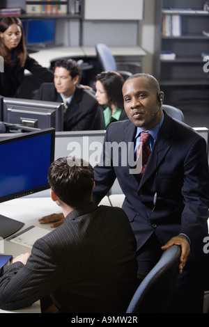 Business people working in a busy office Stock Photo
