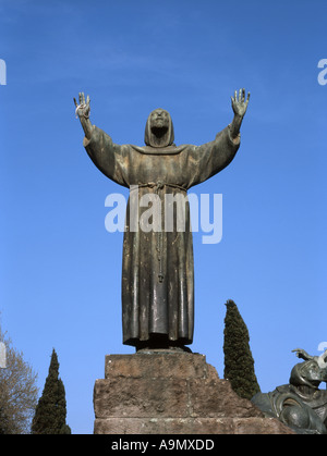 Rome, Lazio, Italy. Statue of Saint Francis in Public gardens by Porta San Giovanni Stock Photo