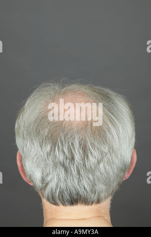 elderly man vertical close up of back of balding head Stock Photo