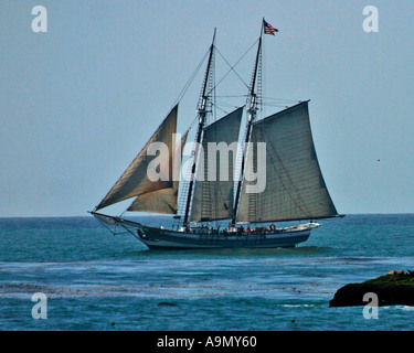Sailboat the Spirit of Dana Point at sea in Dana Point Harbor CA Stock Photo