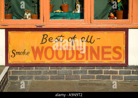 Old advertising sign for Woodbine cigarettes, at the Crich Tramway Village, near Matlock, Derbyshire, England, UK Stock Photo
