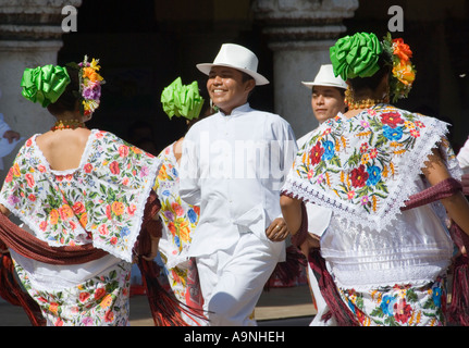 Dancers in Traditional Colourful Embroidered Dress Performing during Merida en Domingo Yucatan Peninsula Mexico 2007 NR Stock Photo