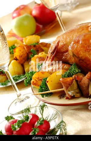 Festive food flavoured roast chicken and fried appetizing potatoes Holiday dinner meal celebration turkey Stock Photo