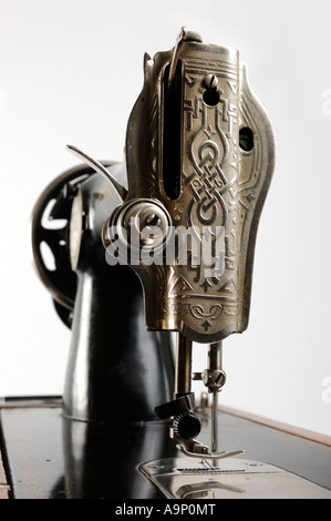 antique sewing machine isolated on white background Stock Photo - Alamy