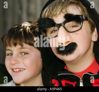 Portrait of boys with silly disguise