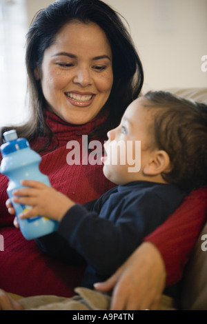 Mother holding little boy Stock Photo