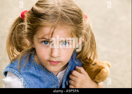 Portrait of young girl with teddy bear Stock Photo