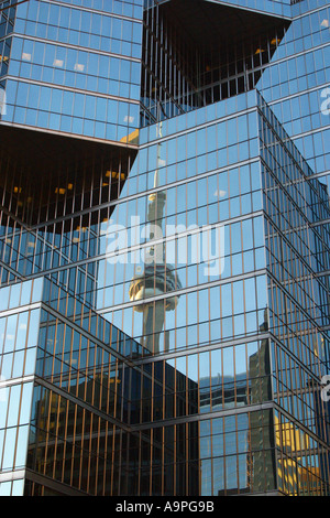 CN tower reflected in window glass of modern office building Toronto Canada Stock Photo