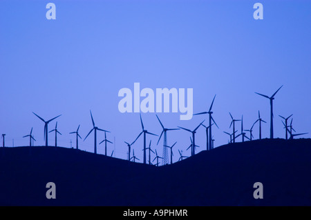 Wind turbines at the Tehachapi Wind Farm 2nd largest in the world at sunset Tehachapi Mountains Mojave California Stock Photo