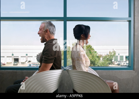 Open-mouthed colleagues Stock Photo