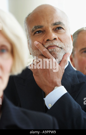 Portrait of a business man looking thoughtful Stock Photo