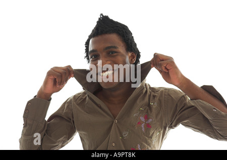 Studio shot of attractive fashionable young black man grinning happily Stock Photo