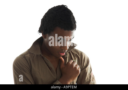 Studio shot of worried looking young black man Stock Photo