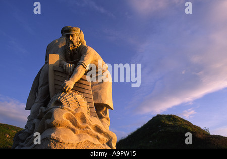 The Spirit of Portland stone sculpture cast in the light of the setting sun in Dorset county England UK Stock Photo