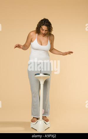 Woman on scales Stock Photo