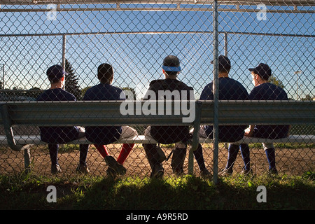 Five teenagers watching from the sidelines Stock Photo - Alamy