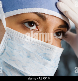 Indian female doctor wearing surgical mask Stock Photo