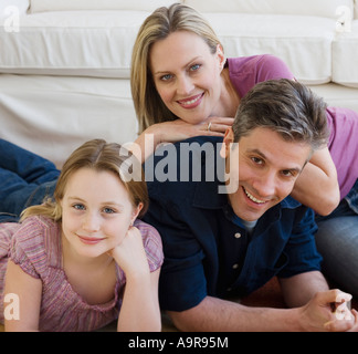 Portrait of family on floor Stock Photo