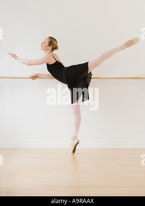 Female ballet dancer in dance studio Stock Photo