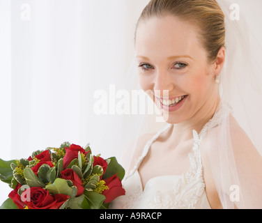 Close up of bride holding bouquet Stock Photo