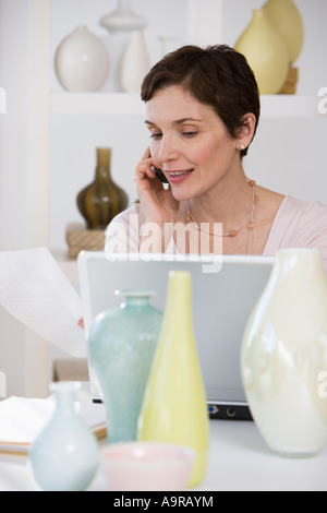 Woman working in pottery Stock Photo - Alamy
