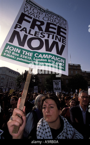 Woman with placard demonstrating against the Israeli occupation of Palestinian territory Trafalgar Square London Stock Photo
