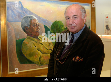 The Artist Harold Riley is pictured with his portrait of Nelson Mandela ...