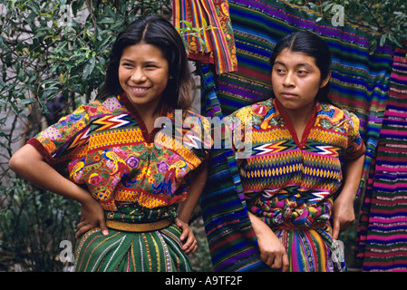 Maya teenagers dress in hand brocaded and woven blouses and skirts San Antonio Aguas Calientes Guatemala Stock Photo