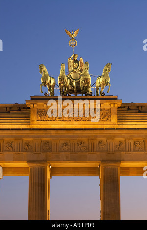 Berlin Paris square brandenburg gate quadriga at twilight Stock Photo