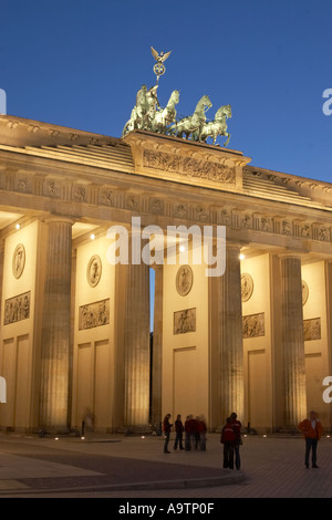 Berlin Paris square brandenburg gate quadriga at twilight Stock Photo