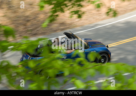 MINI Cooper S convertible on rural road Stock Photo