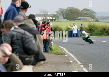 Spectators watch the action at Mathers Cross at the North West 200 Road Races NW200 Northern Ireland Stock Photo