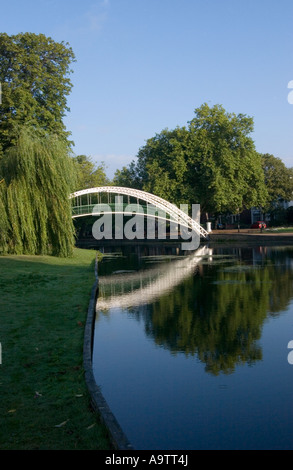 iron suspension bridge on sunny morning on the river ouse bedford uk Stock Photo