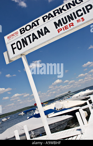 WISCONSIN Fontana Small town marina on Lake Geneva popular vacation destination boating sign over municipal pier Stock Photo