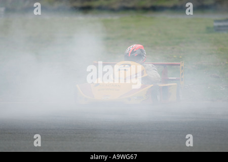 Liam Fox spins his 250cc superkart at 500 MRCI Race Meeting Kirkistown Circuit County Down Northern Ireland Stock Photo