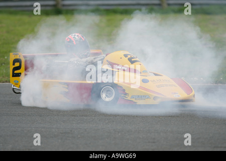 Liam Fox spins his 250cc superkart at 500 MRCI Race Meeting Kirkistown Circuit County Down Northern Ireland Stock Photo