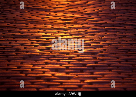 Cobblestone road background Stock Photo - Alamy