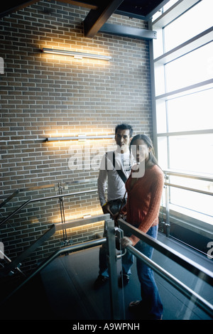 University students standing on stairway between classes Stock Photo