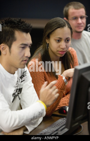 University students using computer Stock Photo