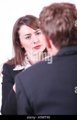 young man and woman in an office Stock Photo