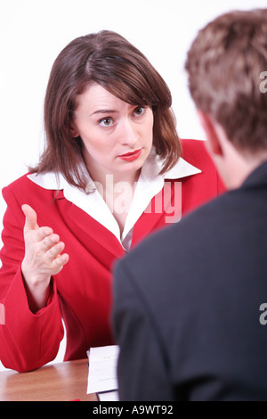 young man and woman in an office Stock Photo