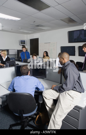 Group of young workers in office Stock Photo
