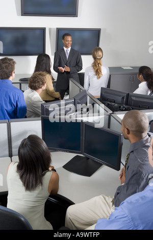 Group of young workers in office having meeting Stock Photo