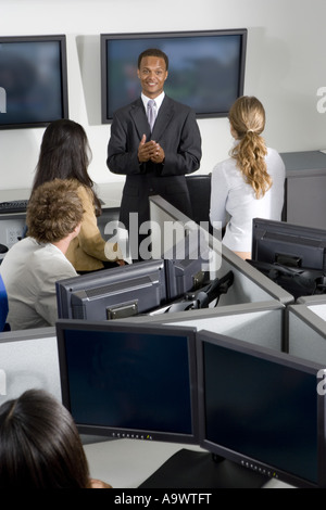 Group of young workers in office having meeting Stock Photo